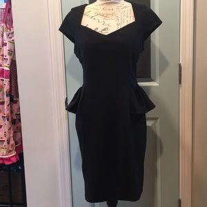 Black peplum dress size 12 Betsey Johnson